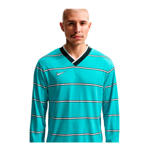 A person wearing a Nike Energy Long Sleeve T-Shirt in teal with thin white and black horizontal stripes and a V-neck collar.