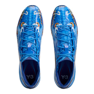 Pair of blue adidas F50 Hyperfast Elite Y-3 FG Soccer Cleats for kids, featuring a dragon graphic and the Y-3 logo on the insoles.