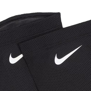 Two black Nike Nike Guard Lock Elite Sleeves featuring a white swoosh logo.