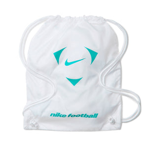 White drawstring bag featuring a teal Nike Tiempo Maestro Elite logo in the center and Nike football printed at the bottom.