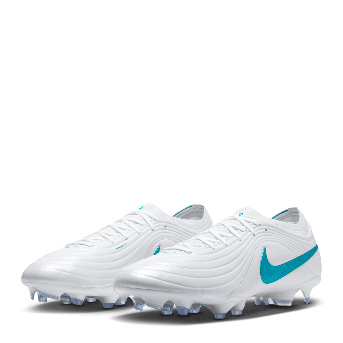 Nike Tiempo Maestro Elite soccer cleats in white with a teal swoosh logo and translucent studs.