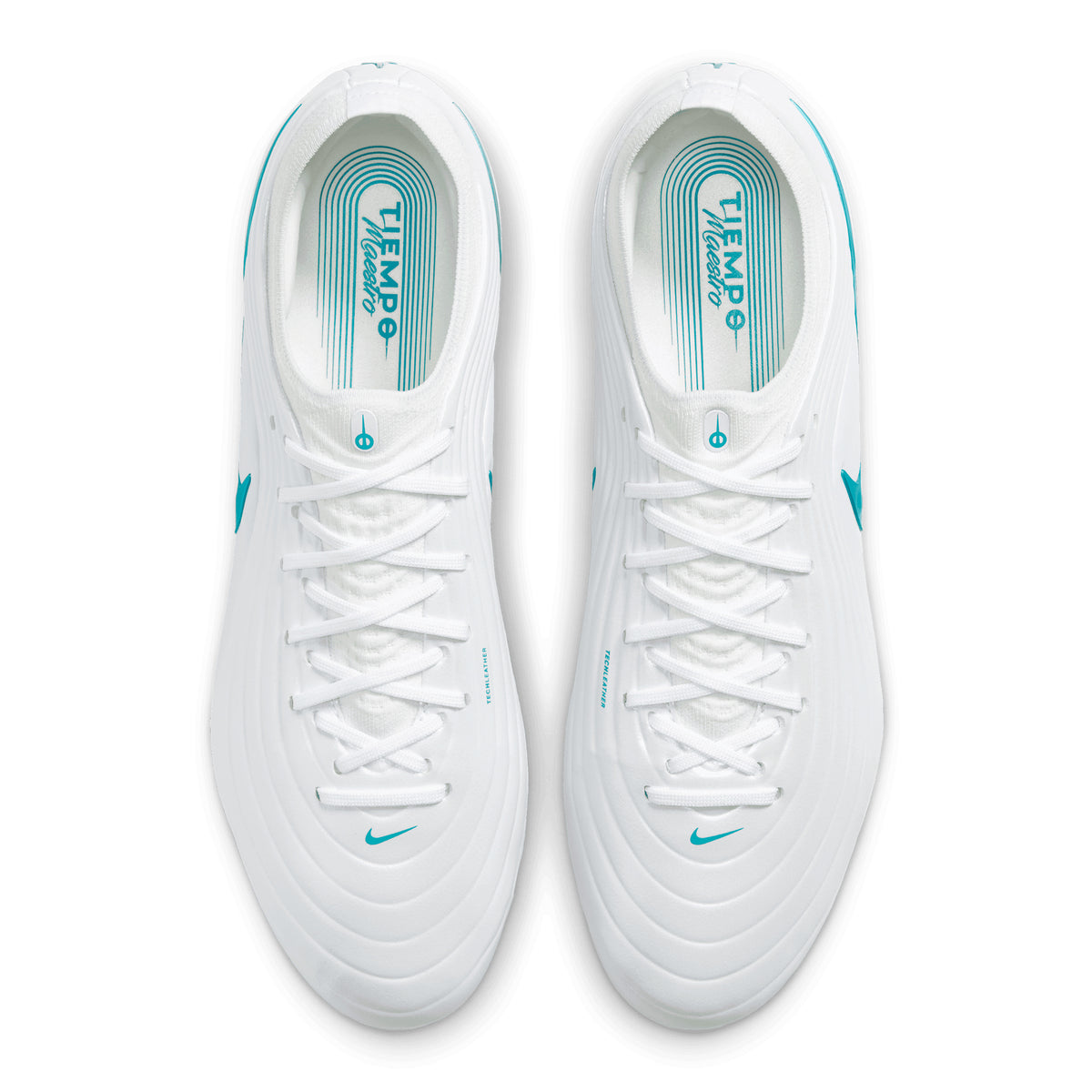 Top-down view of a pair of white Nike Tiempo Maestro Elite soccer cleats with teal accents and white laces.