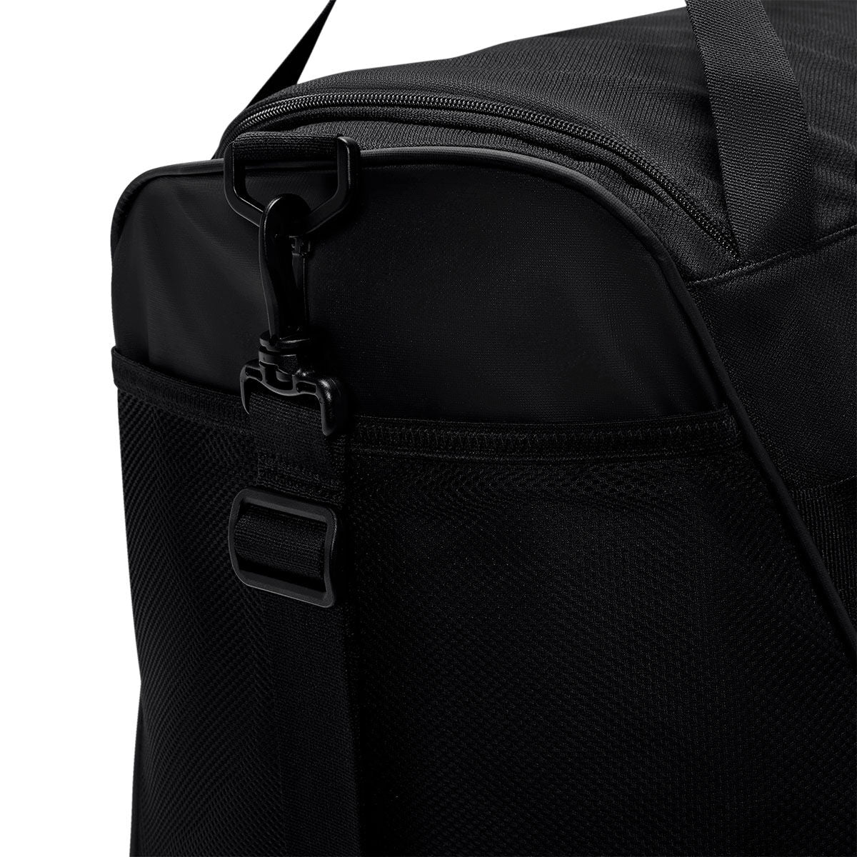 Close-up of a black Nike Academy Duffel Bag, showing the zippered main compartment and the plastic clip attachment for a shoulder strap.