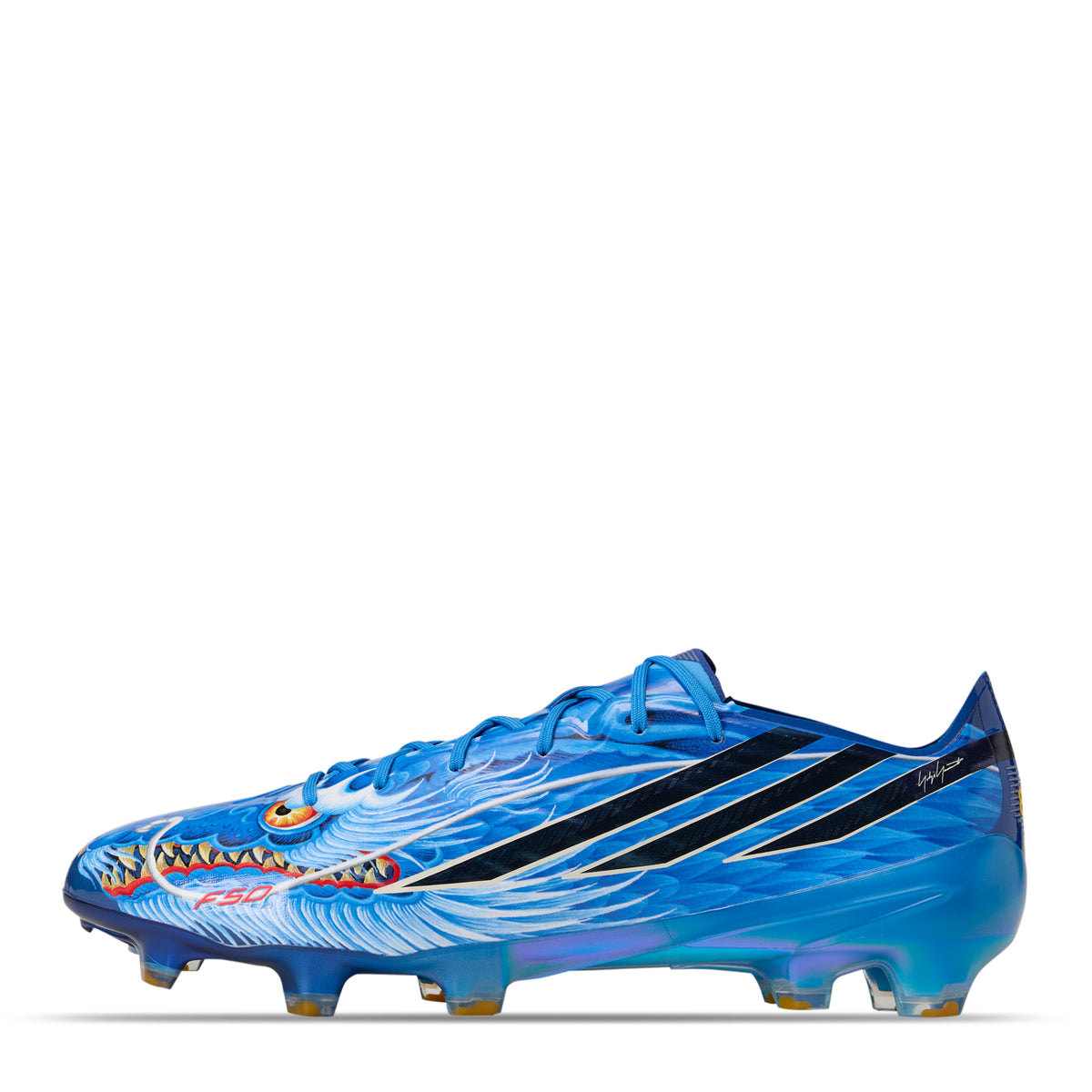 Adidas F50 Hyperfast Elite Y-3 FG soccer cleats in blue, featuring a white and orange dragon graphic on the side and black stripes.