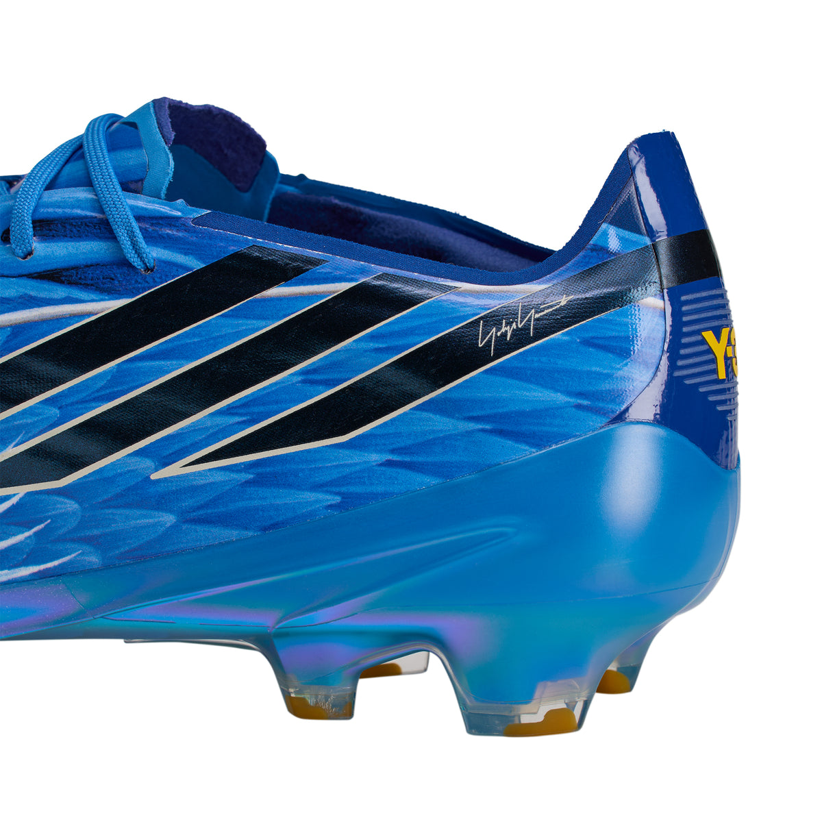 Blue adidas F50 Hyperfast Elite Y-3 FG Soccer Cleats with black stripes, a signature graphic on the side, and a metallic iridescent sole plate.