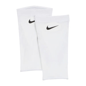 Two white Nike Nike Guard Lock Elite Sleeves with a black swoosh logo on each, perfect for completing your official soccer gear.